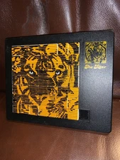 Vintage handheld Tiger Slide puzzle by Pussy