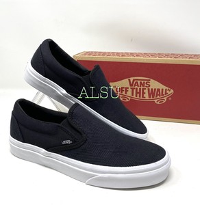 vans black herringbone slip on