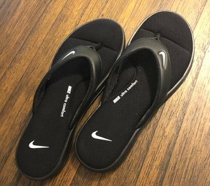 nike white flip flops womens