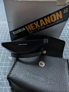 Konica Hexanon AR Mount 28mm F/3.5 Lens, with Caps, Case, lens hood.