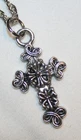 Delightful Swirl Armed Floral Accent Cross Pendant Necklace