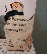 primitive-style stuffed fabric snowman decoration
