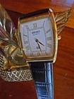 vintage seiko quartz slim white face gold case tonneau , fresh battery