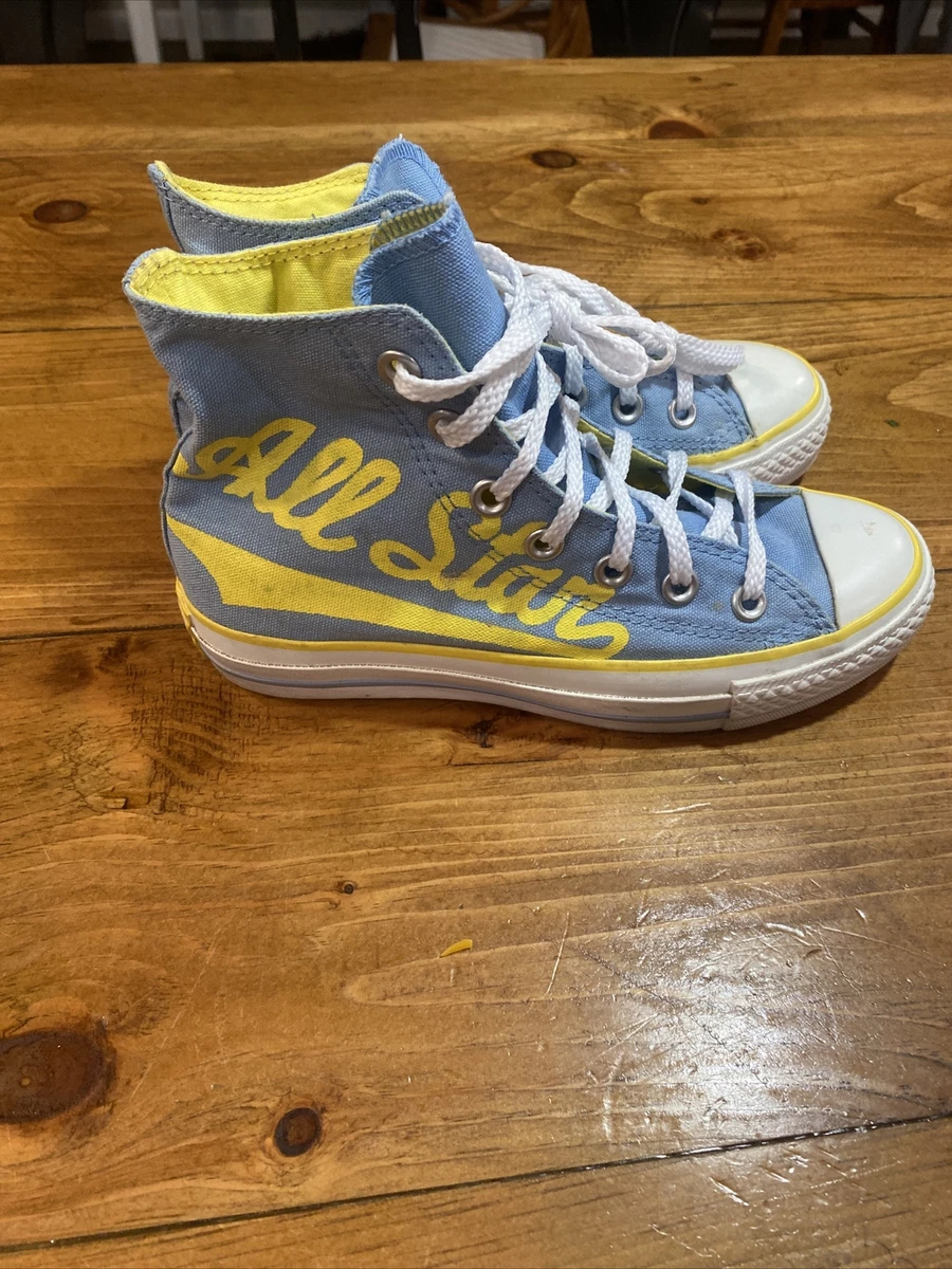 Blue and yellow top converse all stars