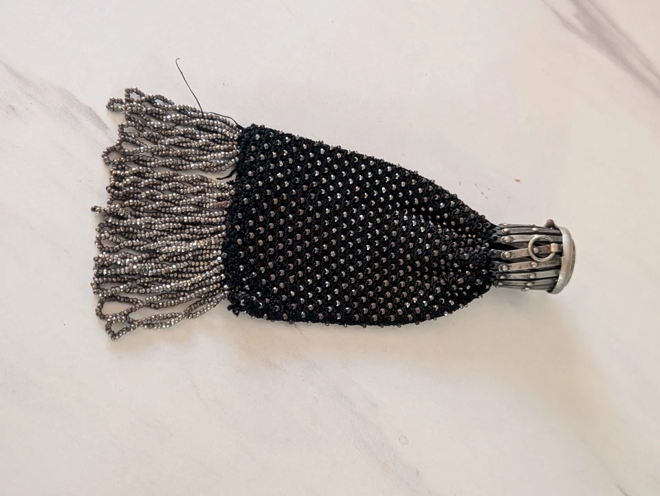 Cuello puerta monedero Miser's Foto 2 de 4