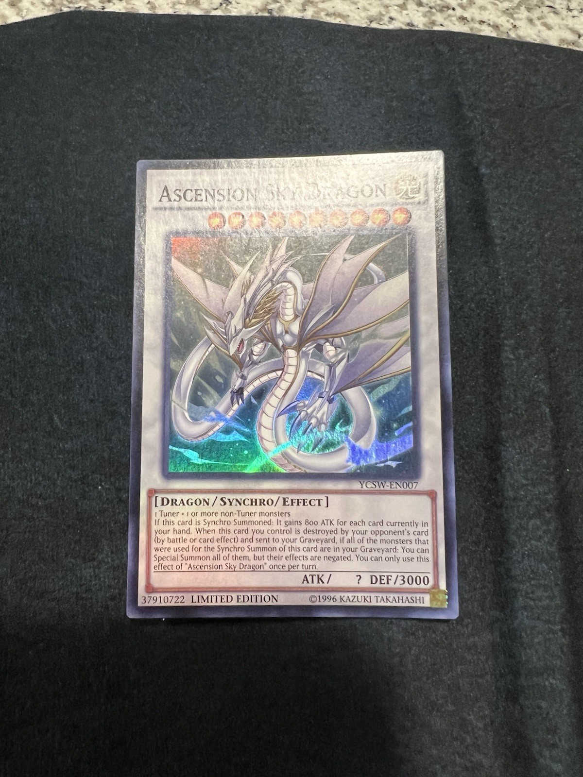 Ascension Sky Dragon YCSW-EN007 YuGiOh Championship Series trading card — raw and PSA graded price guide