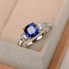 1.3ct Natural Blue Sapphire Round Accent Trilogy Ring 14k White Gold Plated