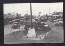 REAL PHOTO HOBBS NEW MEXICO DOWNTOWN STREET SCENE OLD CARS POSTCARD COPY