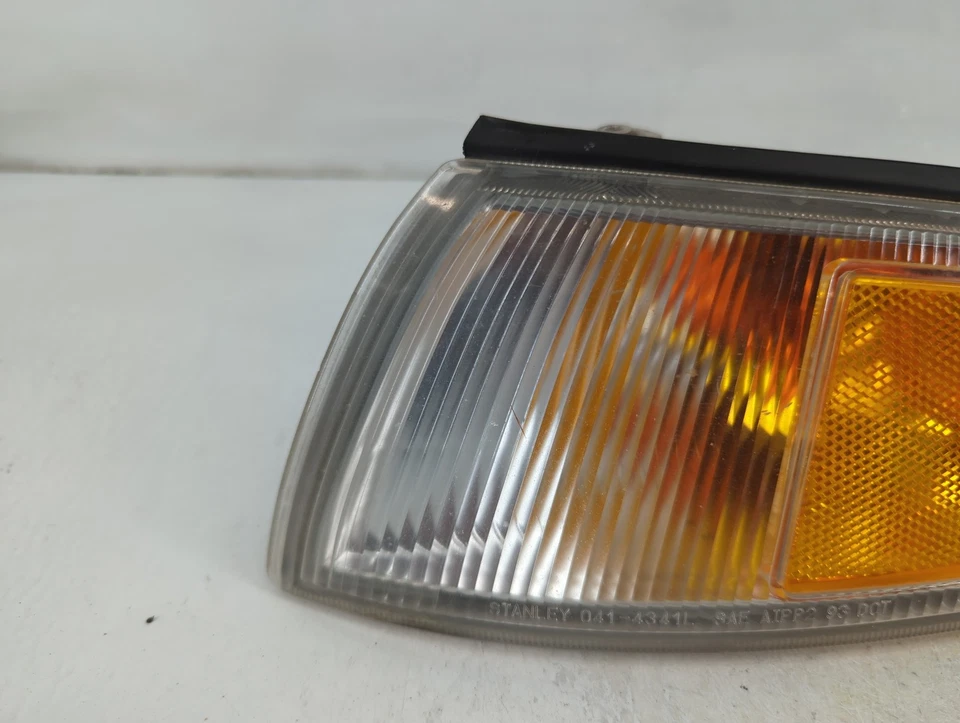 Luz de cabeza izquierda OEM para conductor Mitsubishi Mirage 1997-2002 lámpara RHTSZ Foto 2 de 4