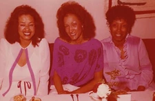 Festive Dining Friends Women Table Set Smiling Enjoying Meal