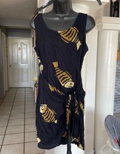 Mango moon Black and gold fish print dress, perfect for a night out #fishprint