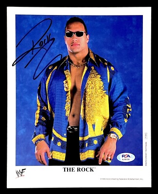 WWE THE ROCK P-583 SIGNED 8X10 PROMO PHOTO WITH PROOF AND PSA COA