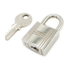 HERM S Hermes Cadena Metal Padlock - DUTY FREE