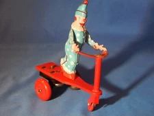 Vintage ROLI-ZOLI Wind-Up CLOWN on SCOOTER  Made in Hungary  NEW   No Key - CUTE