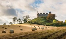 Landscape scotland castle field sunlight hills trees Custom Gaming Mat Desk