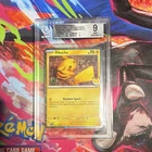 Pokemon TCG SV Temporal Forces Pikachu 051/162 Cosmos Holo Promo Eng BGS 9