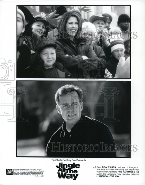 1996 Press Photo Phil Hartman & Rita Wilson in Jingle All the Way - cvp57875
