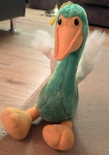 Pluszak ptak, kaczka, zielony z białymi skrzydłami, pomarańczowymi stopami i dziobem