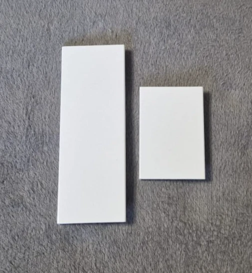 Pair of Genuine Nintendo Wii Console Port Door Covers in White - Image 1 of 2