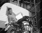 st-103 William Shatner on his BSA Motorcycle reading the script on Desilu Studio