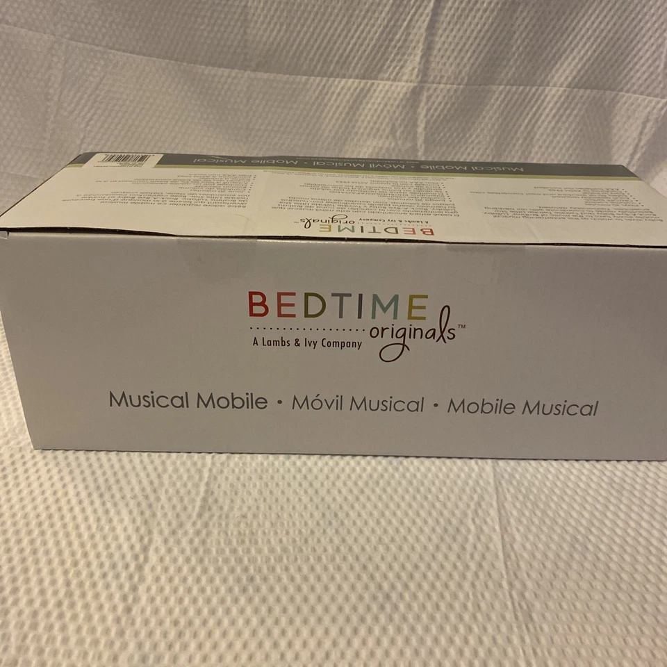 Bedtime Originals Poderosos Animales de la Selva Jirafa, Cebra Musical Cuna Móvil. Foto 2 de 4