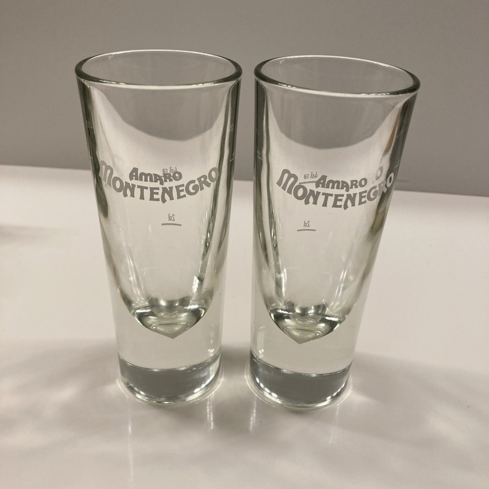 Authentic Italian Amaro shot glasses with heavy bottoms and Italy stamp — tiny, sturdy, and dripping with old-world bar charm.
