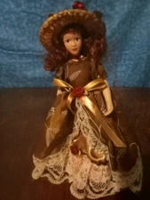 Porcelain Doll With Movable Arms And Legs Colorfull Dress With Stand