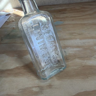 ANTIQUE EMBOSSED 3 OUNCE SLOAN'S LINIMENT KILLS PAIN  MEDICINE 5 INCH BOTTLE 