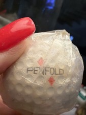 PENFOLD golf ball with 2 red diamonds, in original wrapper