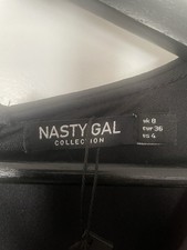 Dazzle in this black sequin dress. Long sleeves and elegant design.