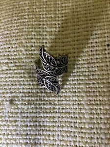Ring silver colored size approximately 5/8" diameter