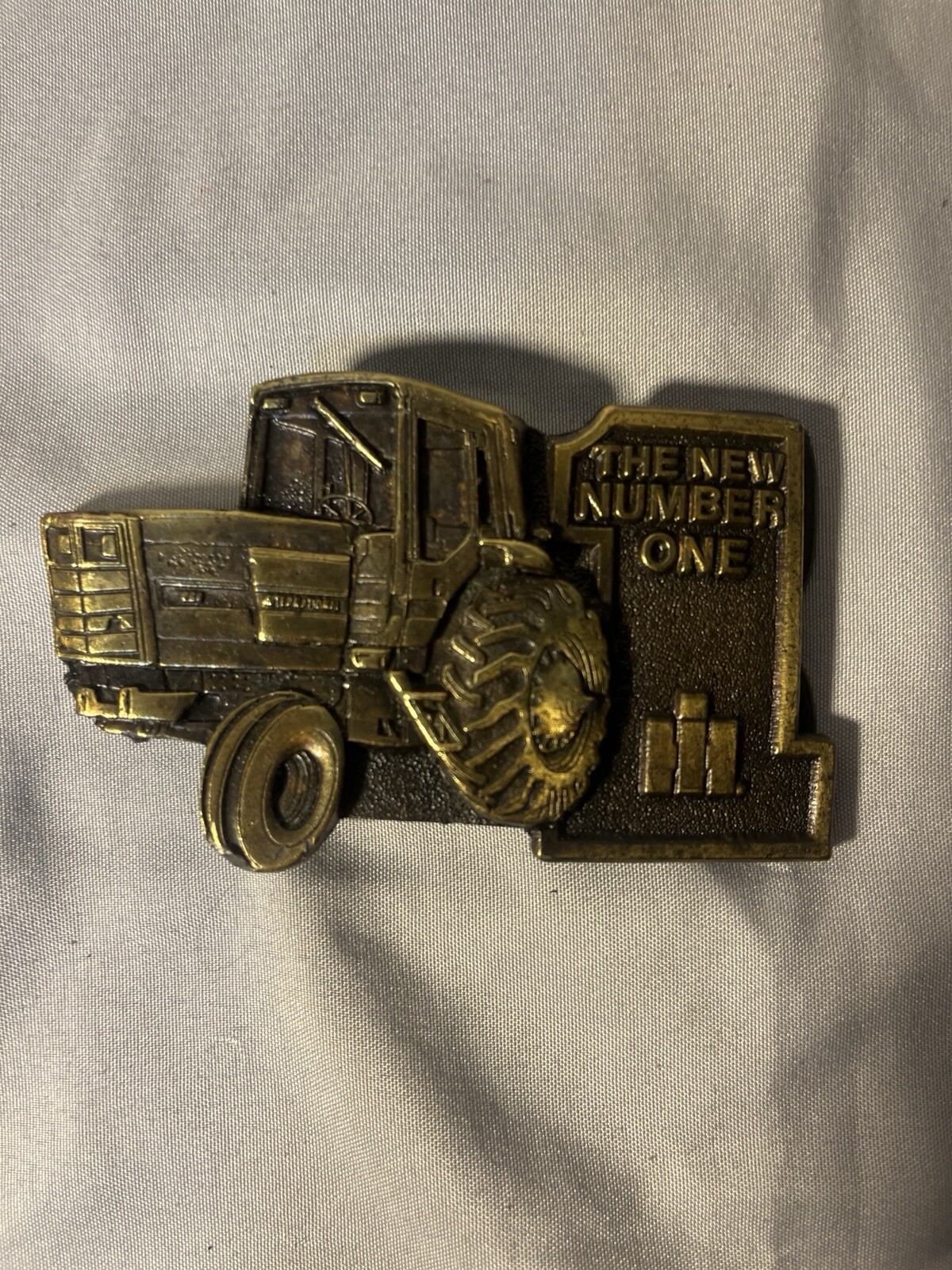 Vintage International Harvester "The New Number One" Belt Buckle Tractor