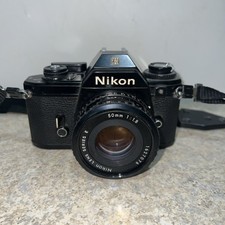 Nikon EM 35mm SLR Film Camera w/Nikon 50mm f/1.8 Lens Film TESTED Good Condition