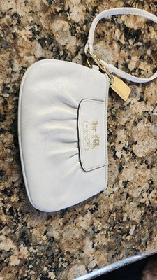 coach money  bag , the logos  barely seen , leather