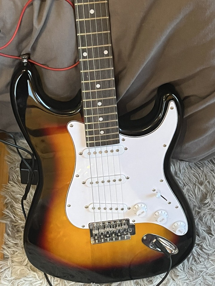 Boxed RockJam Electric Guitar Kit with 10Watt Amplifier And Headphones