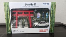 TOMICA DIOCOLLE 64 CARSNAP 03a HATSUMOUDE W/ TOYOTA COROLLA 1500 SE 1/64 SCALE