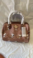 NWT Coach X Peanuts CBM33 Rowan Satchel Bag Signature Canvas Snoopy Print OUTLET