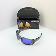 Oakley Fuel Cell OO9096 Transparent Gray Frame Blue Lens Sunglasses New Box