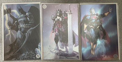 Full set of Jim Lee foil Absolute Batman, Superman and Wonder Woman. Unopened.