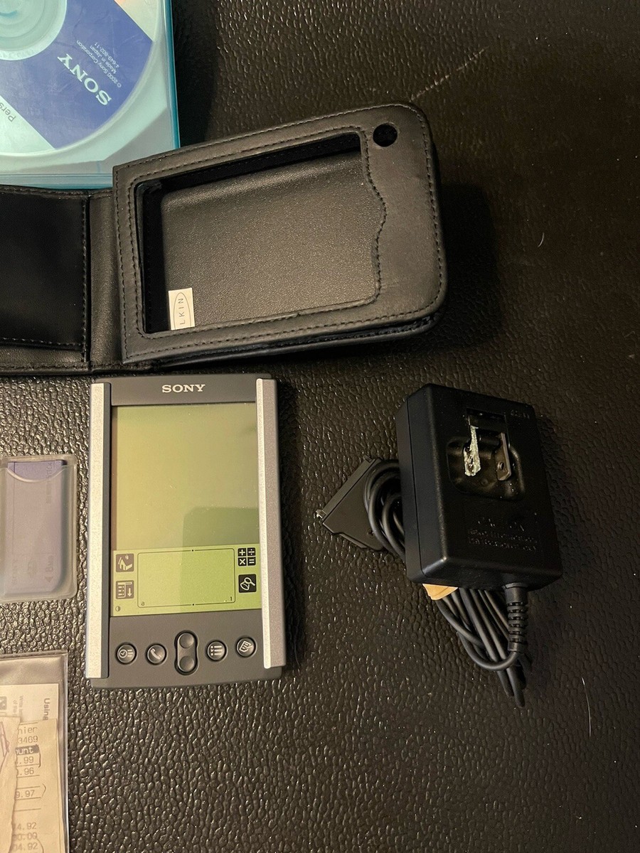 Sony CLIE PEG-S300/E Handheld Palm Powered 8MB Memory Charger Dock