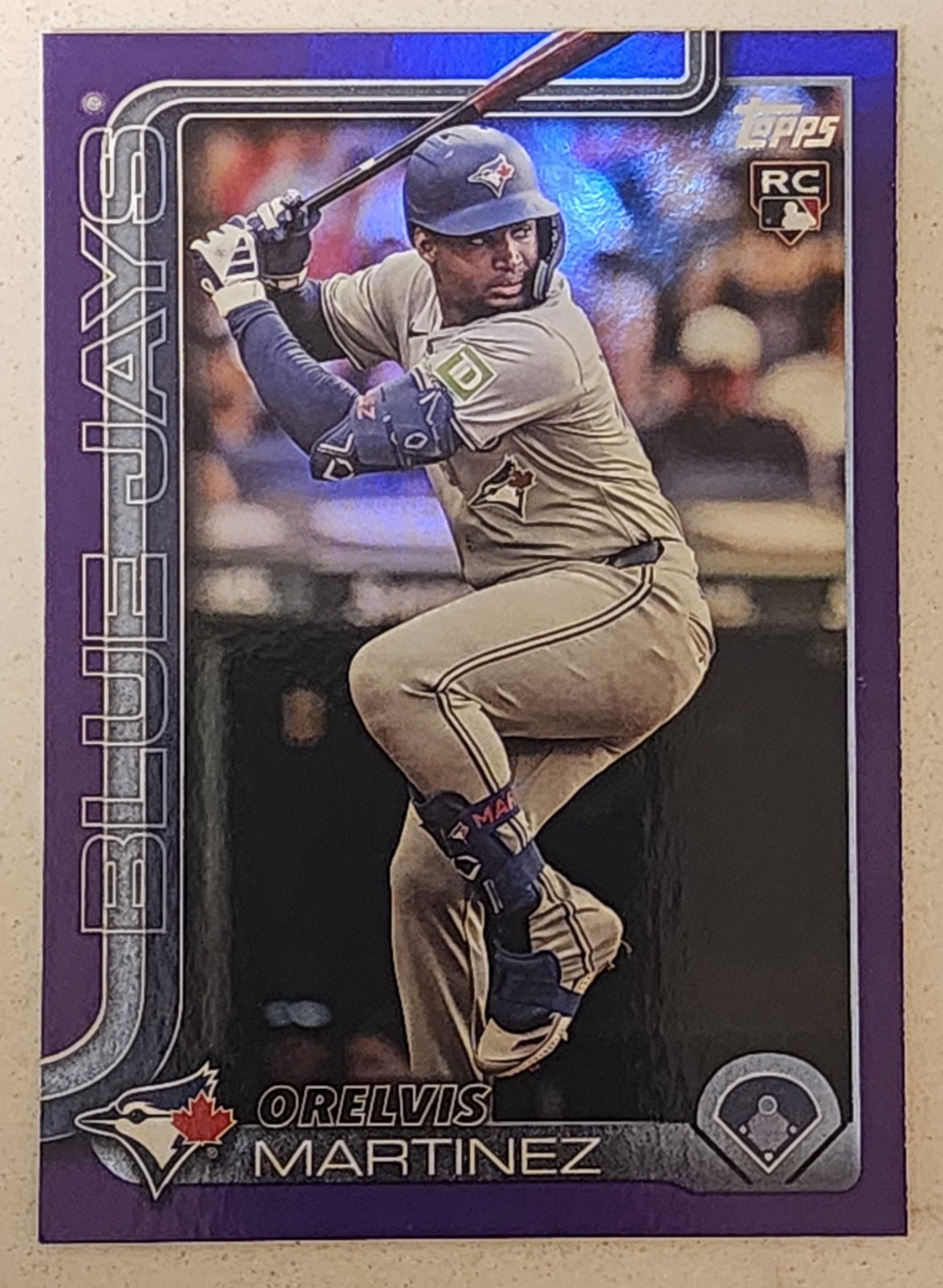 2025 Topps Series 1 Orelvis Martinez Purple Holo Foil RC /250 Blue Jays #18