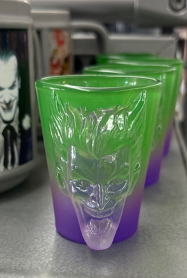 Six Flags Theme Parks Shot Glass Joker face / Batman face