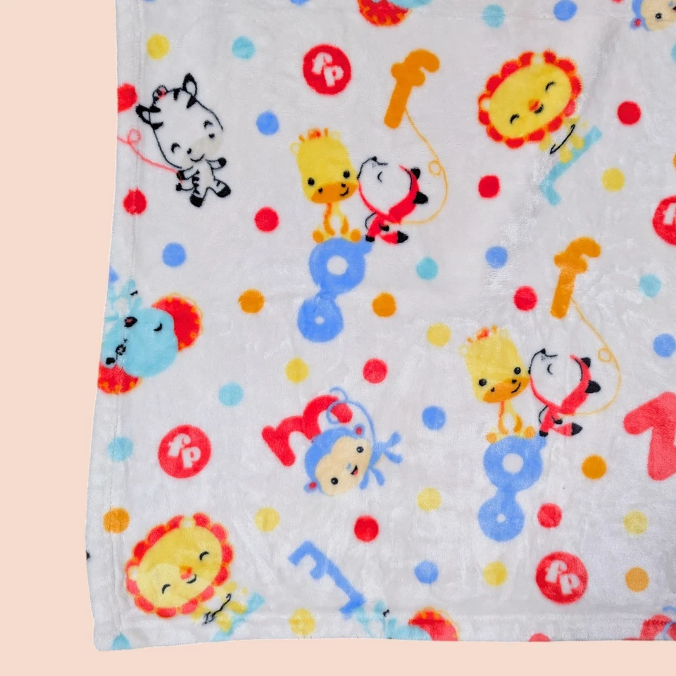 Manta bebé Fisher Price cebra león elefante jirafa safari zoológico letras números Foto 2 de 4