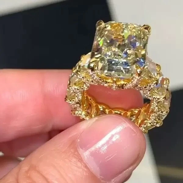 Anillo de boda de eternidad enchapado en oro de 14 k con zafiros y diamantes de corte radiante creado de 9 quilates Foto 2 de 4