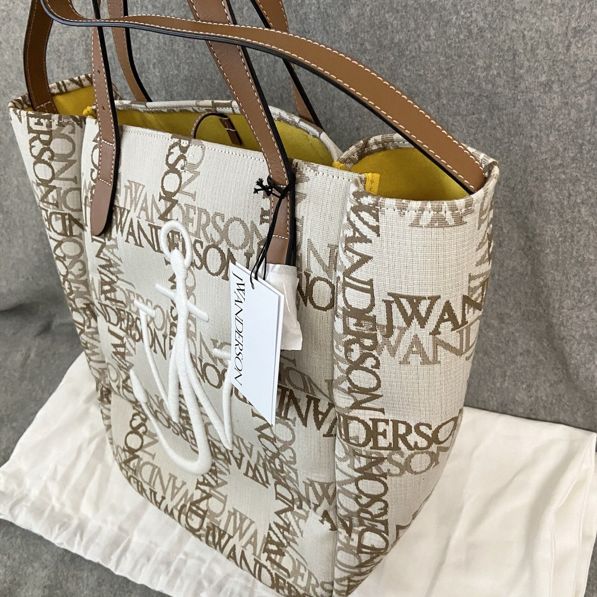 トートバッグ J W ANDERSON Belt Tote Bag Gray HB0243FA0146929 HB0243FA0146 JW Anderson Logo Belt Tote by J.W. Anderson- La Garçonne