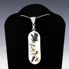 NATIVE AMERICAN ZUNI EAGLE & HUMMINGBIRD PENDANT BY QUINTIN QUAM
