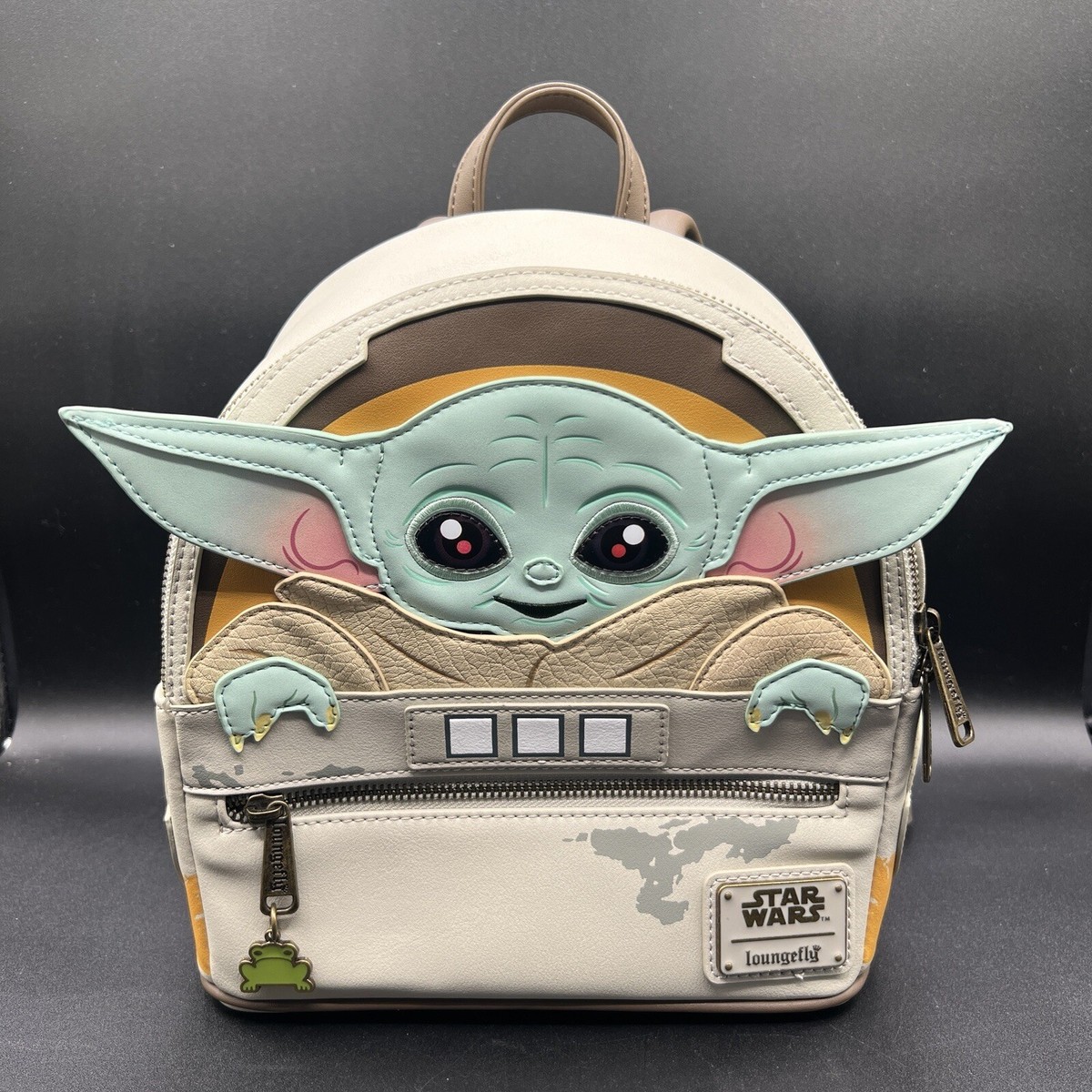 baby yoda mini backpack loungefly HKDL This adorable mini backpack features a hidden pocket behind an applique in the shape of a bag Loungefly Star Wars The Child