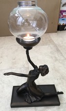 A BEAUTIFUL SCULPTED ART DECO DANCER ON A PLINTH WITH A GLASS GLOBE AND CANDLE 