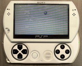 PSP GO PlayStation Portable White Game Console WITH STORAGE UPGRADE AND MORE