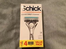 New Schick Quattro Titanium Razor and 4 Refill Cartridges